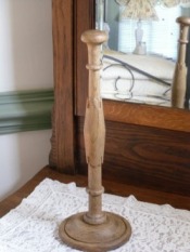A turned Victorian hat stand, with carving details on stem.