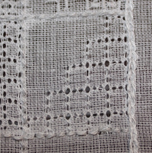 Square backed stitch is worked diagonally.