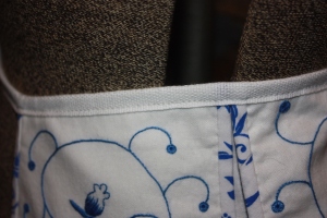 The top edge of the pocket bound.